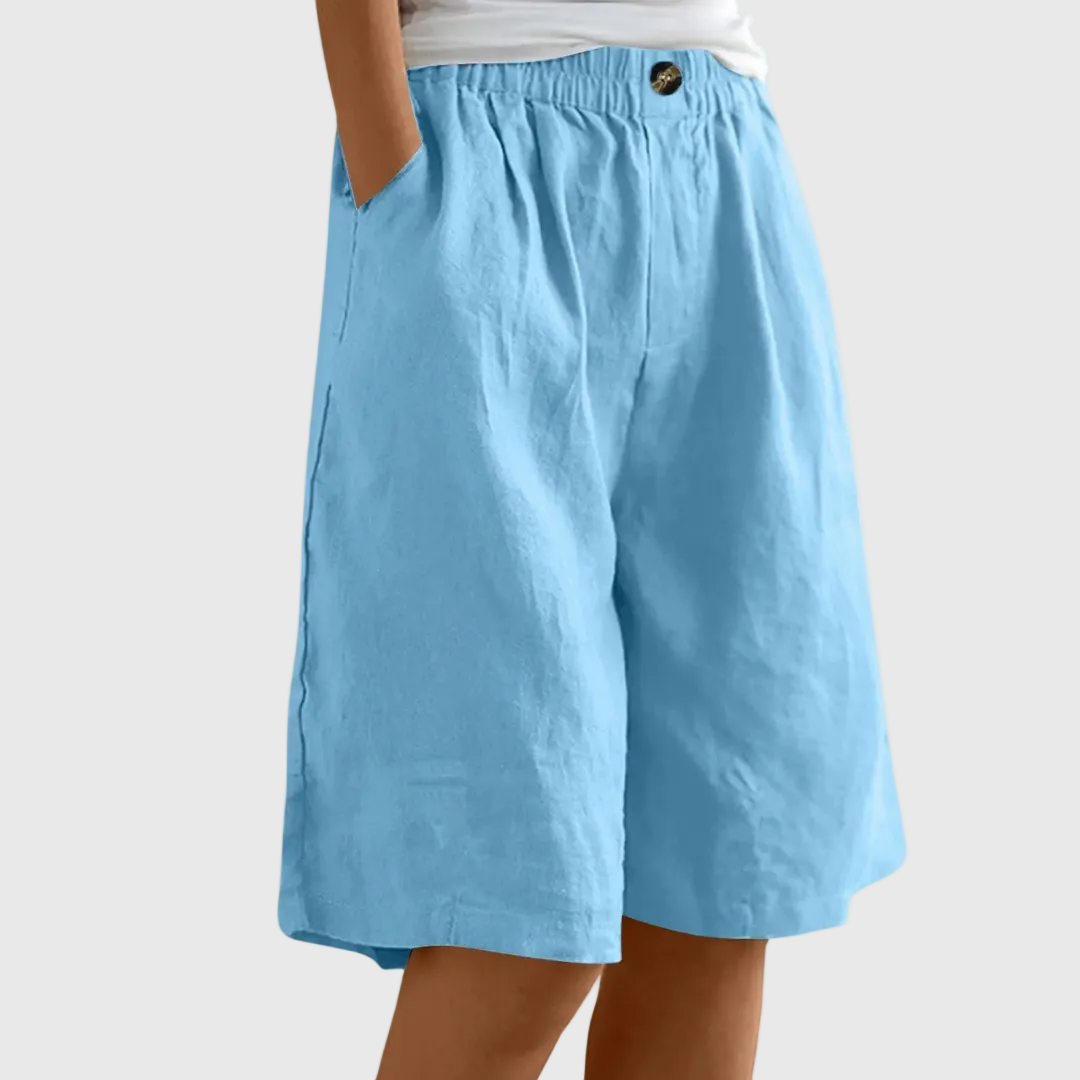 Löysät polvipituiset shortsit joustavalla vyöllä ja taskuilla