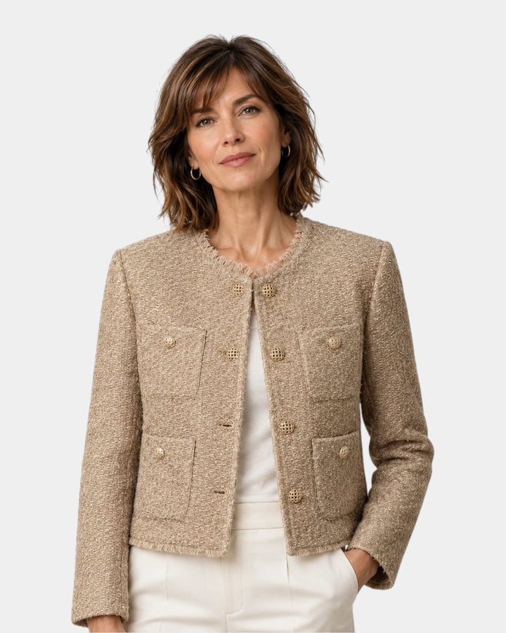 Lyhyt beige takki kultaisilla nappeilla
