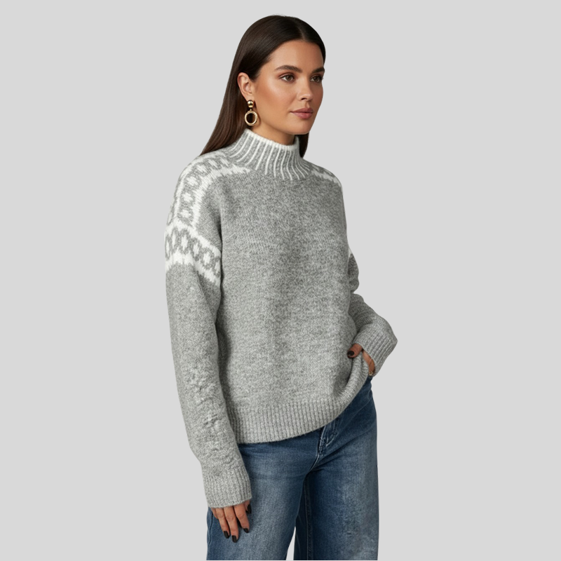 Paksu neule, jossa on kontrastinen jacquard-kuvio olkapäissä